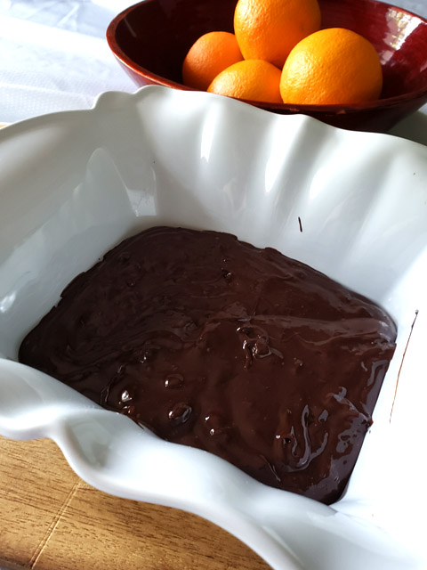 shallow baking dish with melted chocolate ganache